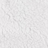 Close-up of the Noortje Bows Silk Throw's reverse side, showing a dense white sherpa fleece texture in polyester.