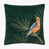 Odisha Exotic Bird Animal Velvet Cushion in emerald green, square with piped edge, showing an embroidered orange and blue bird among gold-thread palm fronds, on a plain white background.