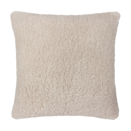 Square Olann cushion in natural beige with a dense, curly faux shearling pile face, shown against a plain white background.