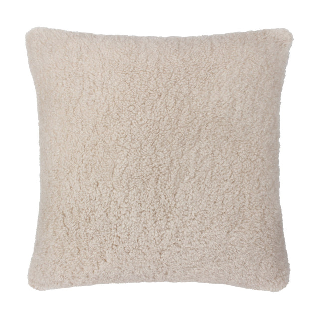 Square Olann cushion in natural beige with a dense, curly faux shearling pile face, shown against a plain white background.