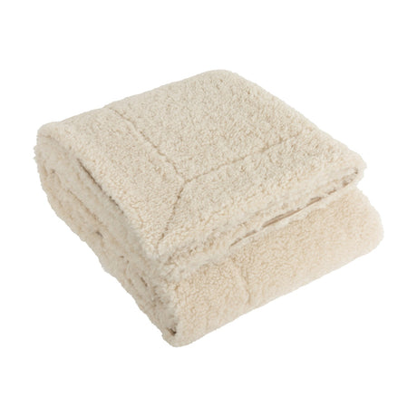 Olann Plain Velvet Throw in natural, folded to show its dense shearling-look faux fleece texture, photographed on a plain white background.