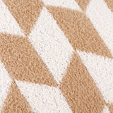 Close-up of the Olsen Geometric Polyester Cushion in beige and cream, showing a textured knitted diamond and chevron pattern on plush feather yarn fabric.