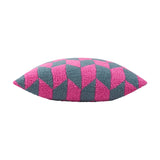 Olsen Geometric Polyester Cushion in Retro Pink, shown side-on against a plain white background, with a textured knitted geometric pattern in raspberry pink and dark teal meeting at sharp diagonals.