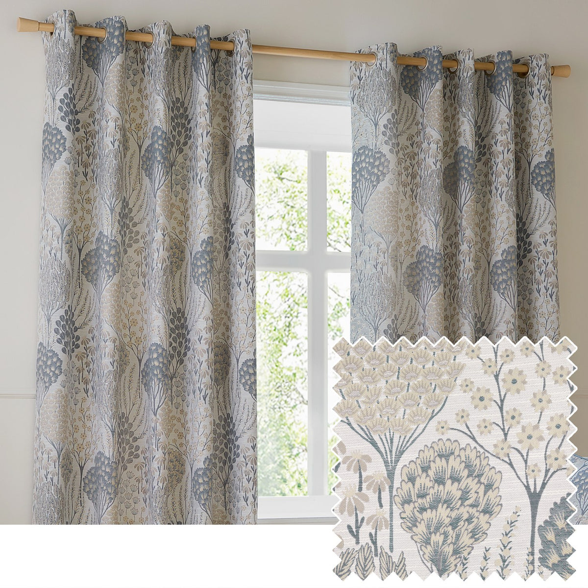 Ophelia Jacquard fully lined eyelet curtains in Wedgewood, hung on a wooden pole, featuring a woven floral tree and daisy pattern in slate blue, gold and taupe on a pale ground.