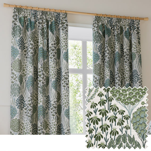 Ophelia Jacquard pencil pleat curtains in Thyme/Mineral, hung on a wooden pole beside a window, featuring a green and blue-grey botanical tree and floral pattern on cream, with a fabric swatch inset.