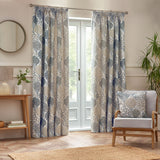 Ophelia Jacquard Polyester Pencil Pleat Curtains in Wedgewood blue and beige botanical print, hung on a pole either side of French doors in a living room.