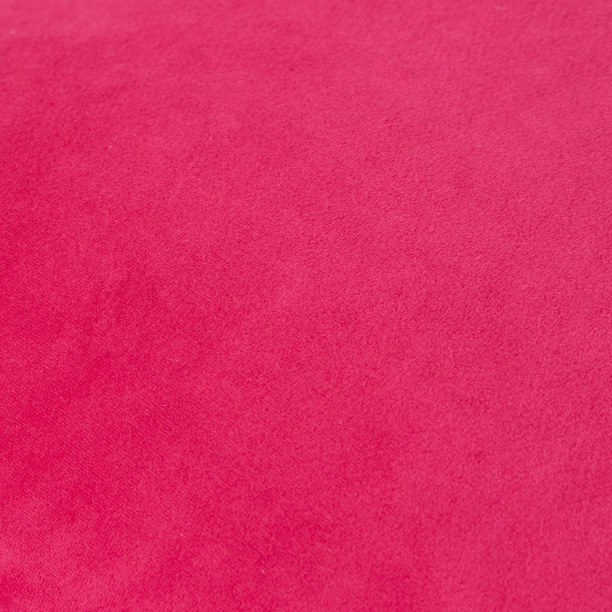 Close-up of the Opulence Plain Velvet Cushion in Cadillac, showing a smooth pink velvet pile in a solid, saturated colourway with no pattern.