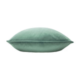 Opulence Plain Velvet Cushion in eau de nil, a soft sage-green square cushion with piped edge, shown side-on against a plain white background.