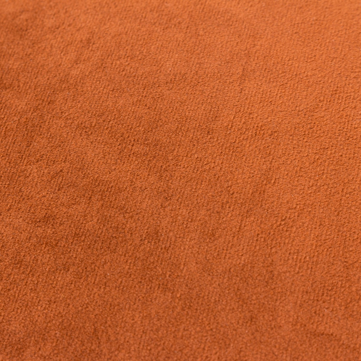 Close-up of the Opulence Plain Velvet Cushion in ginger orange, showing the soft, short-pile velvet texture with a subtle sheen.