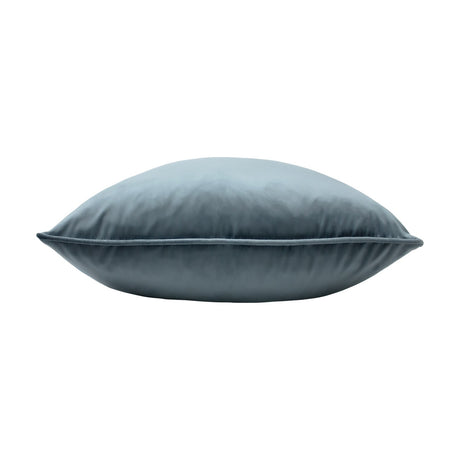 Opulence Plain Velvet Cushion in petrol blue, shown side-on with a plump square shape and piped edge trim, set against a plain white background.
