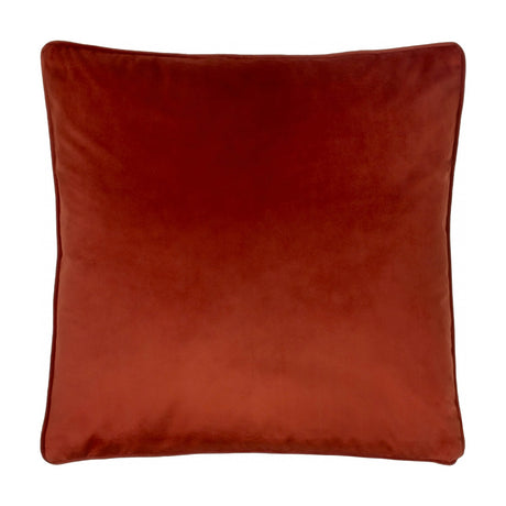 Opulence Plain Velvet Cushion in Sunset, a square rust-orange velvet cushion with a neat piped edge, shown on a plain white background.
