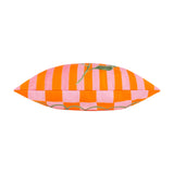 Side view of the Oranges Check Polyester Cushion showing pink and orange striped edges with a checkered base and painted leaf detail, on a plain white background.