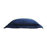 Side view of the Palmeria Velvet Cotton Cushion in navy, showing a quilted velvet surface with an embroidered palm-leaf design, set against a plain white background.