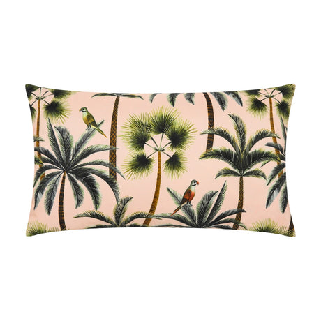 Rectangular bolster-style cushion in blush pink polyester, printed with a tropical pattern of palm trees and perched parrots in green and brown tones, shown on a plain white background.