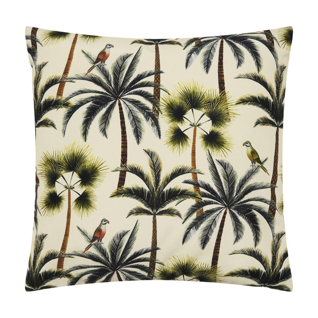 Square outdoor scatter cushion in cream with a repeated palm tree print in green and olive tones, featuring perched parrots, on a plain white background.