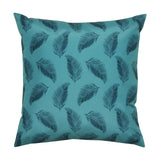 Square teal polyester cushion with an all-over pattern of dark feather or palm leaf silhouettes, shown on a plain white background.