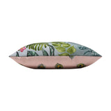 Side view of the Peacock Animal Polyester Cushion, showing green foliage print on one side and dusky pink fabric with peacock-feather motifs on the other, set against a white background.