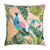 Peacock Animal Polyester Cushion in blush pink, printed with a teal and blue peacock amid green tropical leaves and yellow flowers, shown on a plain white background.