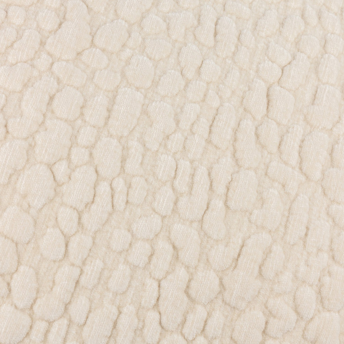 Close-up of the Pebble Linen Chenille Cushion in natural cream, showing raised pebble-textured chenille pile across the fabric surface.