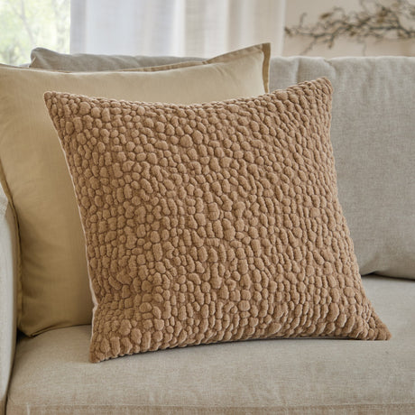 Pebble Linen Chenille Cushion in stone, 45 x 45cm with textured, pebble-like chenille surface, shown on a beige sofa alongside a plain cream cushion.