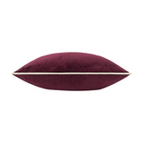 Side view of the Pineberry Forest Animal Velvet Cushion in plum, showing plump velvet fabric with a contrasting cream piped edge, on a white background.