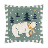 Reversible cotton cushion, 45cm square, with a loop-tufted polar bear in a scarf, navy trees, gold star and snow on green, framed by a cream-and-green striped border.