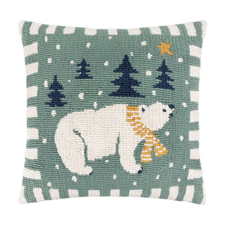 Reversible cotton cushion, 45cm square, with a loop-tufted polar bear in a scarf, navy trees, gold star and snow on green, framed by a cream-and-green striped border.