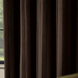 Regency Stripe Velvet Fully Lined Eyelet Curtains in chocolate brown, shown close-up with vertical pile stripes and eyelet heading, hung by a window.