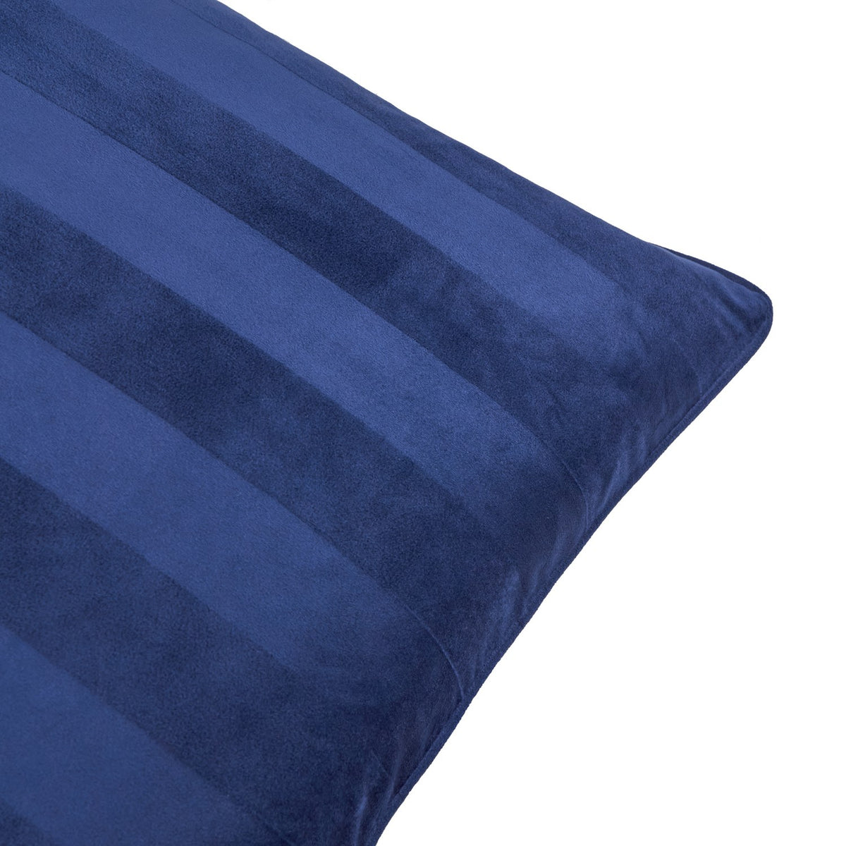 Close-up of the Regency Stripe Jacquard Velvet Cushion in midnight blue, showing tonal woven stripes and a corner seam, on a plain white background.