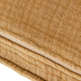 Close-up of the Ribble Reversible Cotton Cushion in honey, showing the ribbed cotton weave and a hidden zip closure along the seam edge.