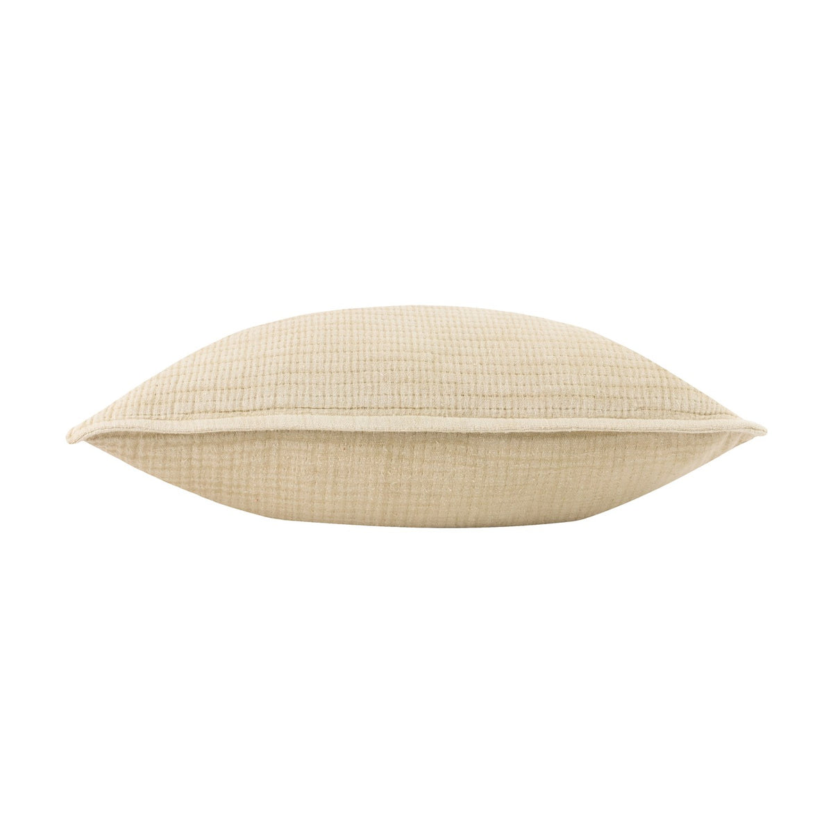 Ribble Reversible Cotton Cushion in natural, side view showing its plump ribbed cotton construction and piped edge on a plain white background.