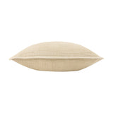 Ribble Reversible Cotton Cushion in natural, side view showing its plump ribbed cotton construction and piped edge on a plain white background.