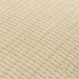 Close-up of the Ribble Reversible Cotton Cushion in natural, showing its textured, ribbed woven cotton fabric with a fine grained surface.