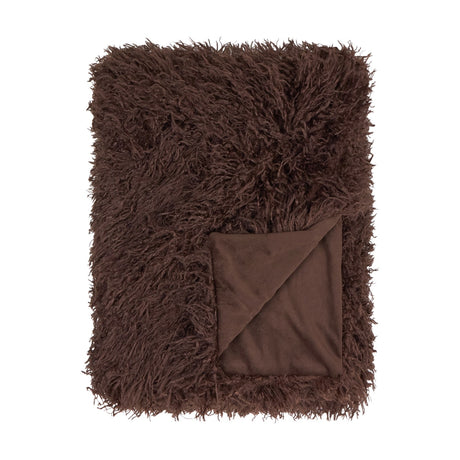 Rowan Velvet Faux Fur Throw in chocolate brown, shaggy Mongolian-style pile with a folded corner revealing the smooth velvet reverse, shown on a plain white background.