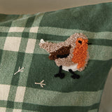 Close-up of the Ramble Cotton Check Duvet Cover Set in green, showing brushed cotton plaid fabric with an embroidered robin bird motif in orange, brown, and cream thread.