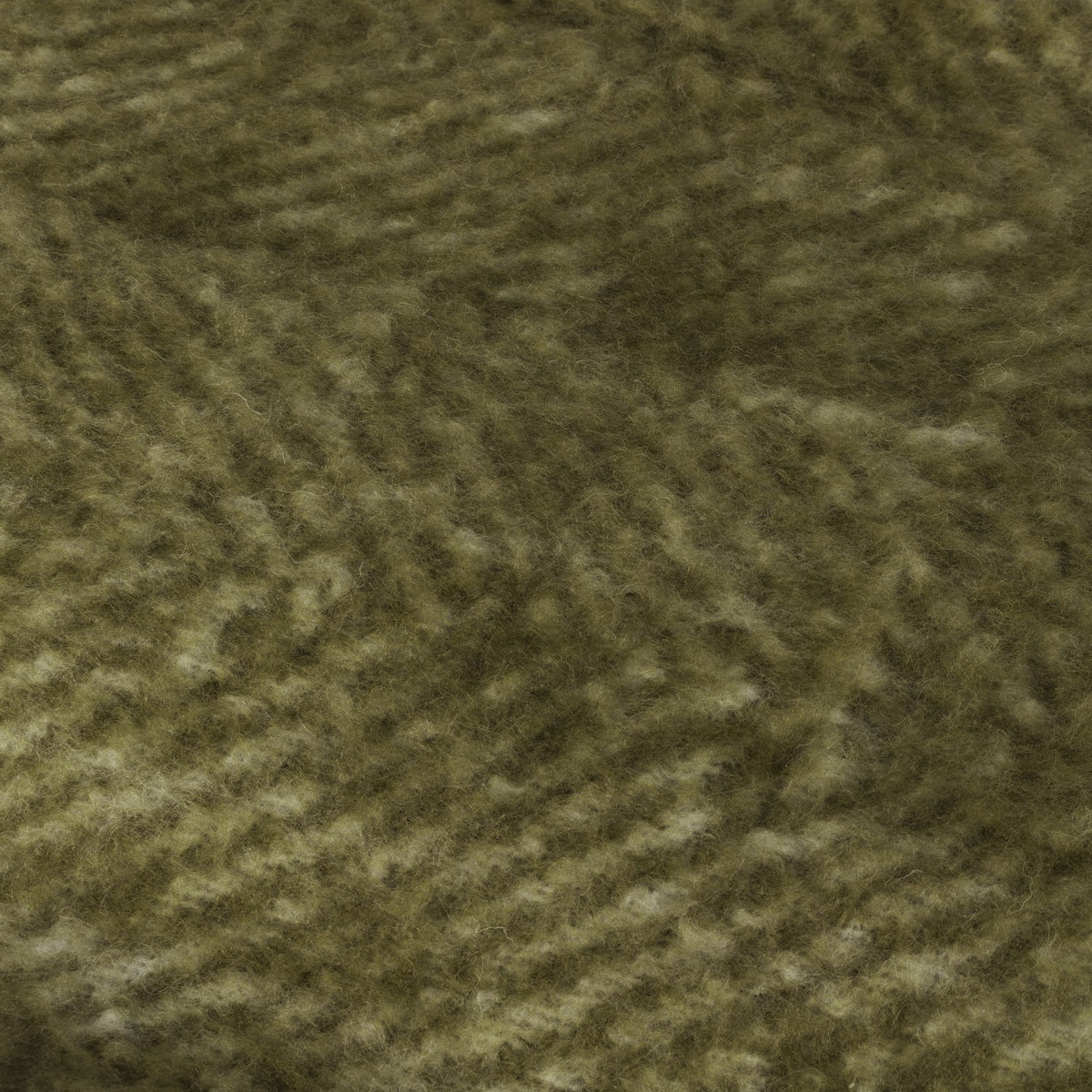 Rawton Ombre Herringbone Wool Throw in Natural/Moss, close-up of the brushed herringbone weave shading from cream to deep moss green.