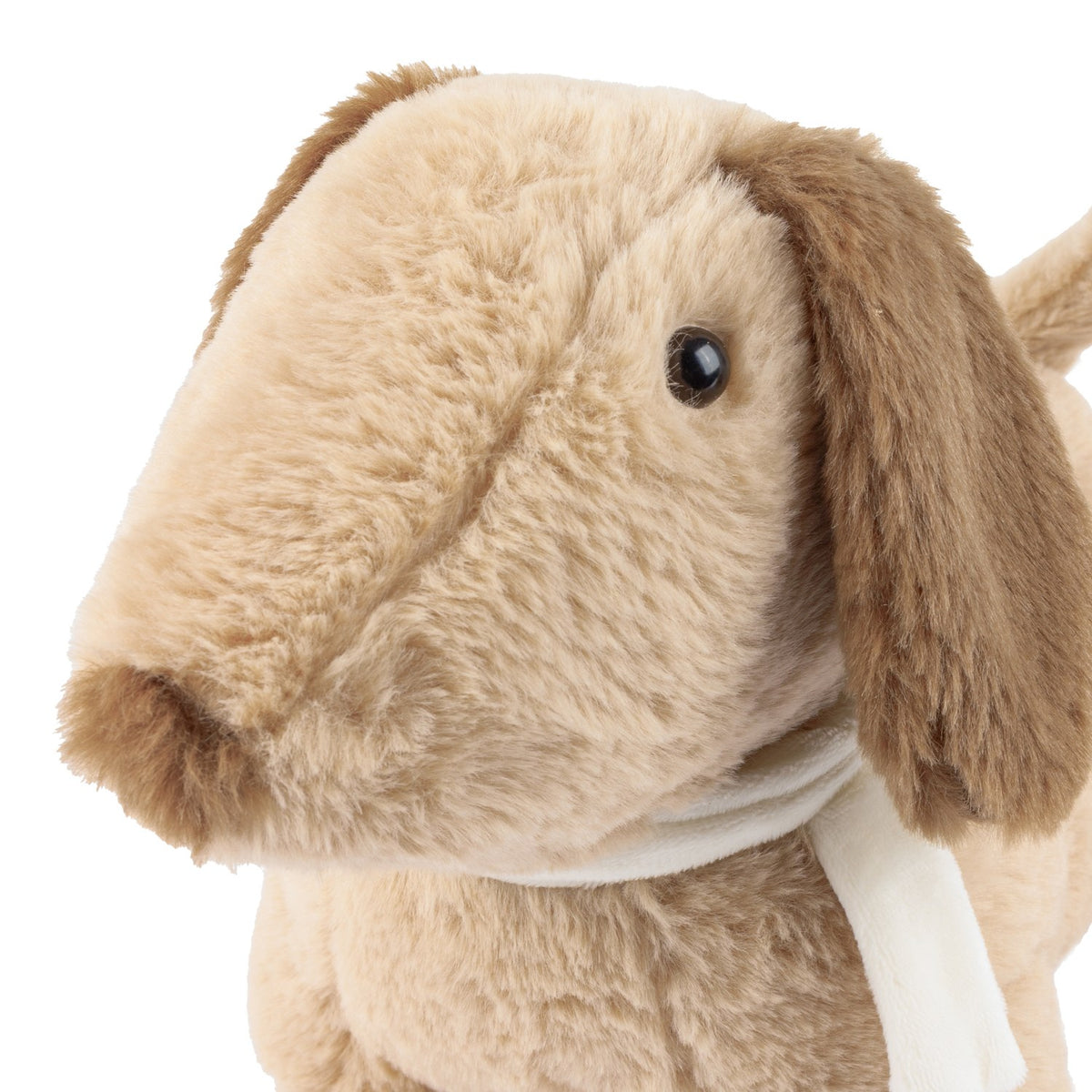 Close-up of the Samson Sand Filled Faux Fur Door Stop, a dog-shaped design in sandy beige with tan drooping ears, a white neck scarf, and stitched muzzle, on a white background.