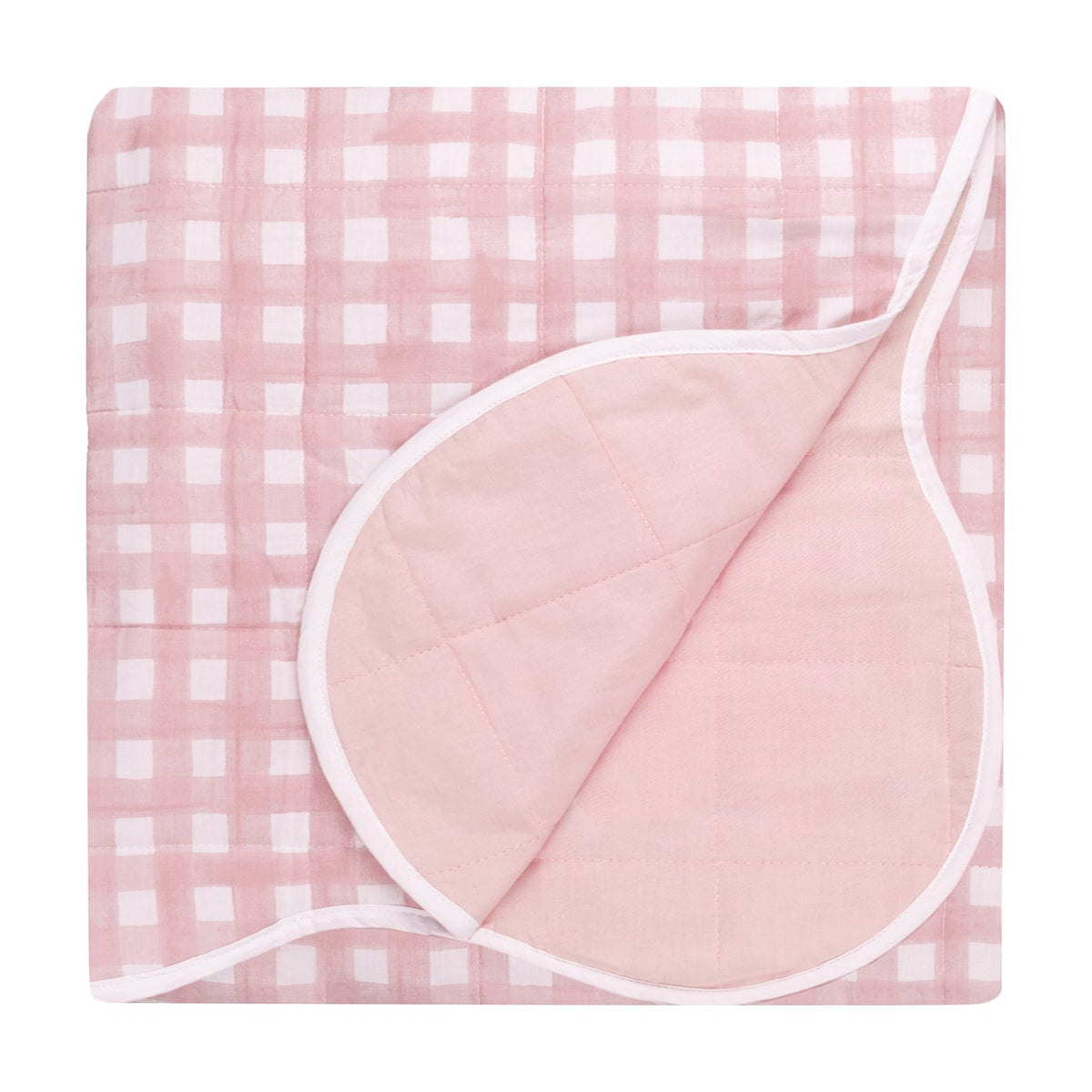 Square-quilted Scallop cotton blend bedspread with a pink and white gingham check on one side and a plain pink scalloped-edge reverse, folded open on a white background.