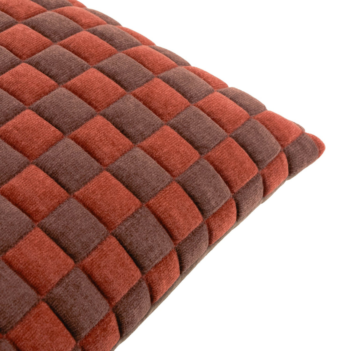 Softie Check polyester cushion in cinnamon and chocolate, close-up of the quilted checkerboard pattern with raised padded squares, shown on a white background.