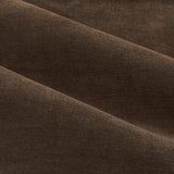 Close-up of soft chenille lined eyelet curtains in chocolate brown, showing the fabric's dense, matt woven texture and soft folds.