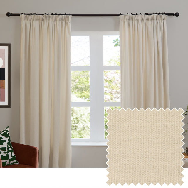 Ecru pencil pleat curtains in soft chenille polyester fabric, shown either side of a window with a black curtain pole, alongside a fabric swatch sample.