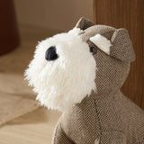 Close-up of the Schnauzer Dog Faux Fur Cotton Door Stop in brown herringbone cotton, showing its white faux fur muzzle, dark button eyes, and pricked ear detail.