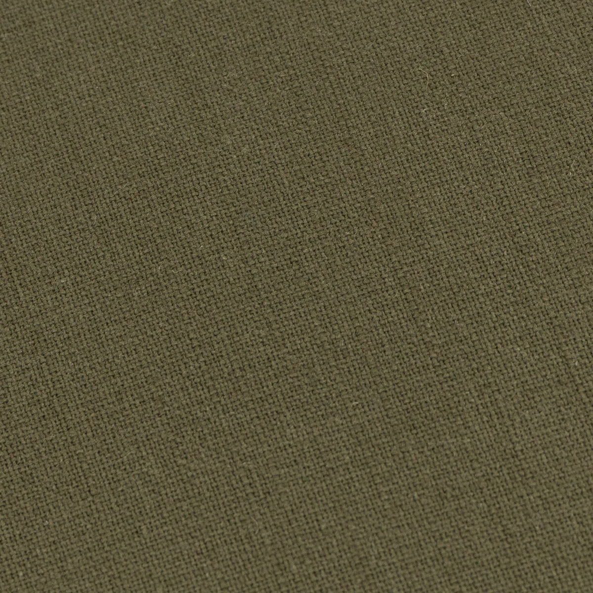Close-up of the Slub Cotton Woven Plain Cushion in Lichen, showing the softly textured, slubbed weave of the muted olive green cotton fabric.