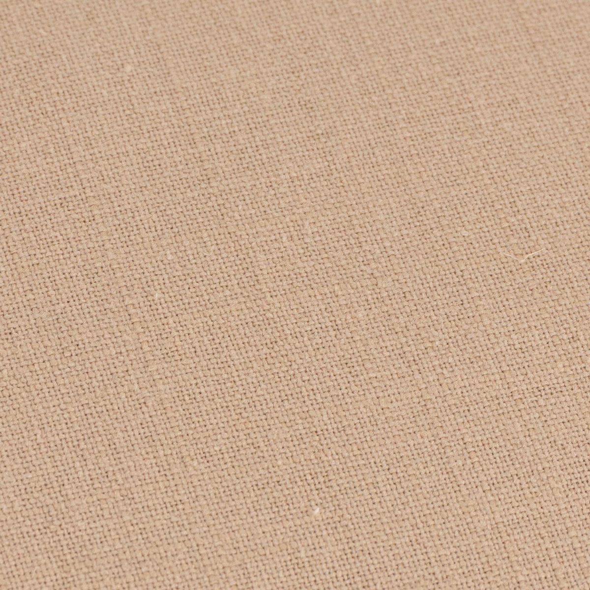 Close-up of the Slub Cotton Woven Plain Cushion in Natural, showing warm beige woven fabric with a slightly irregular slub texture.