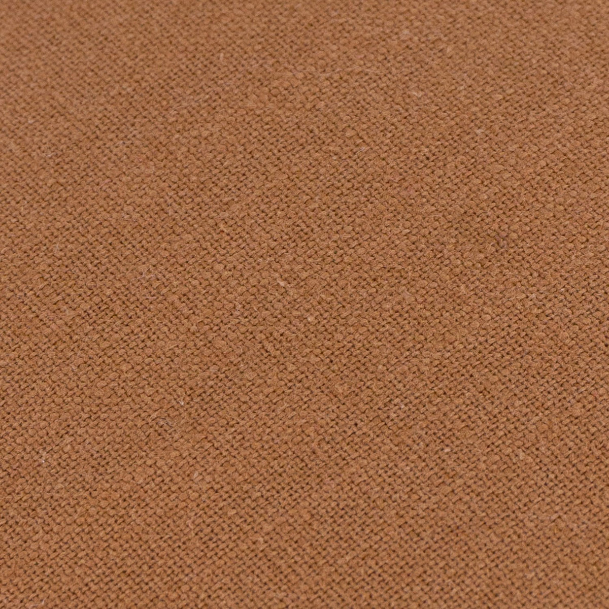 Close-up of the Slub Cotton Woven Plain Cushion in toffee, showing its warm mid-brown, textured slub-weave cotton fabric.
