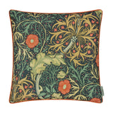 Square Seaweed Floral polyester cushion with indigo ground, orange daisy flowers and gold foliage, finished with contrasting orange piping, on a plain white background.