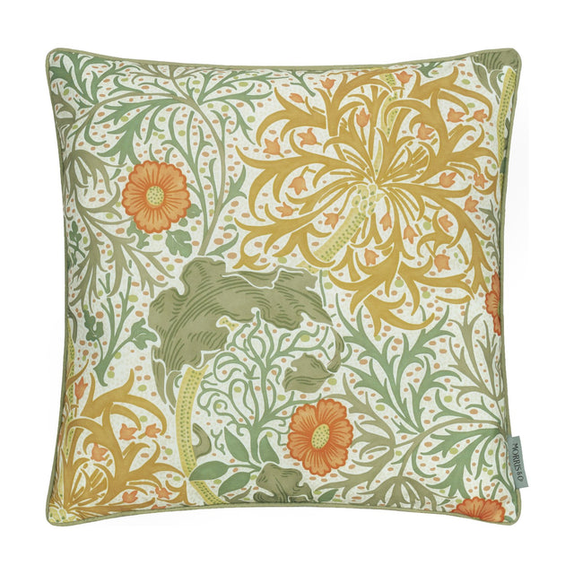 Square polyester cushion in the Seaweed Floral pattern, cream ground with trailing green foliage, gold flowerheads and orange accents, finished with matching piped edging.