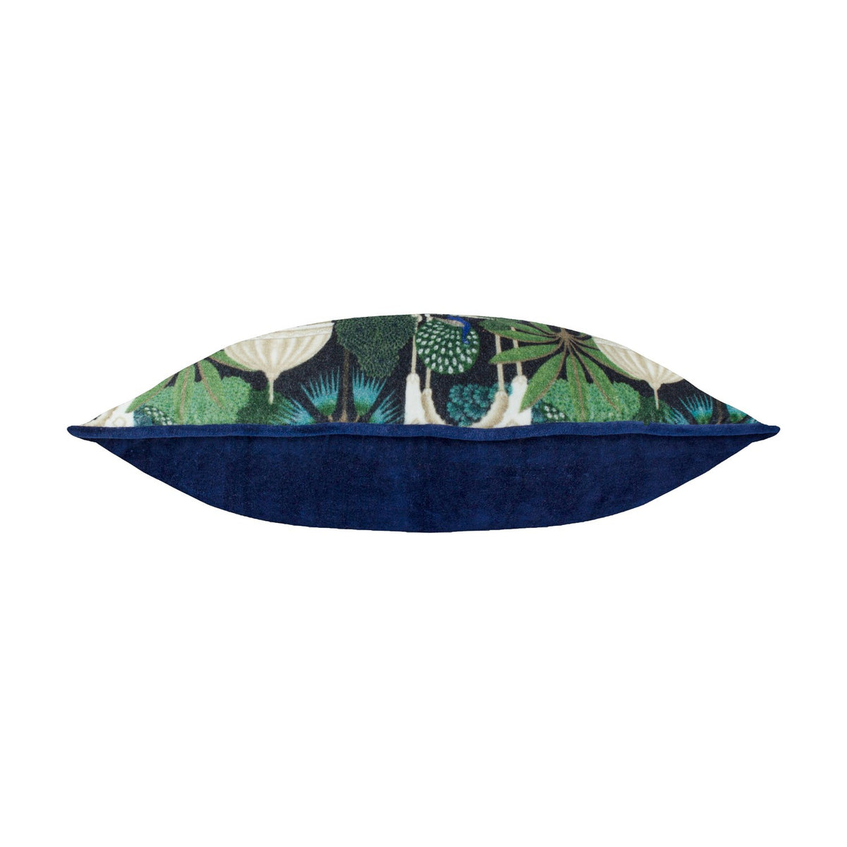 Side view of the Serenity Velvet Cotton Cushion in Midnight, showing plain navy velvet back and printed peacock and palm design edge, on a white background.