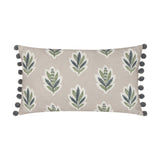 Sessile Leaf Reversible Cotton Cushion in Flax, rectangular bolster with grey pom-pom trim, featuring green and slate blue leaf sprig motifs on a flecked beige ground, shown on a white background.