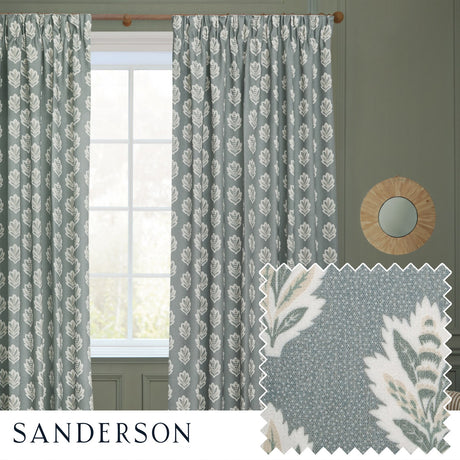 Sessile Leaf pencil pleat curtains in Delph Blue, pinch-pleated polyester panels with a leaf motif, shown at a window beside a fabric swatch and round mirror in a green-toned room.